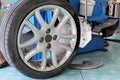 Auto mechanic changing a car tire