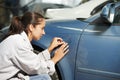 Auto mechanic colourist matching color Royalty Free Stock Photo