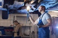 Auto Mechanic Inspecting Car Royalty Free Stock Photo