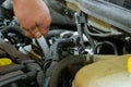 Auto mechanic repairs car