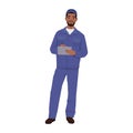 Auto mechanic worker in a uniform standing and writing a document Royalty Free Stock Photo