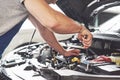 Auto mechanic working in garage. Repair service Royalty Free Stock Photo