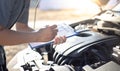 Auto repair specialist has checked the engine repair list for both internal and external systems