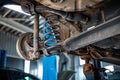 Auto repairs and maintenance closeup of car suspension Royalty Free Stock Photo