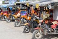 Auto rickshaw, three wheels motorcycle taxi on the street in Myanmar. This transport is cheap and popular in Burma.