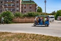 Auto rickshaw transports passengers on the street in Zalizny port Kherson region. Taxi in