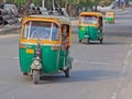 Auto Rickshaws on the Road in Delhi