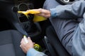 Auto service staff cleaning car interior Royalty Free Stock Photo