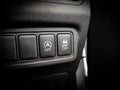 Auto Start and Stop Button and Traction Control Button in a Car Royalty Free Stock Photo