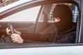 Auto thief driving a stolen car Royalty Free Stock Photo