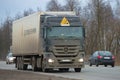The auto train of the transportation expeditionary company `Business Lines` with the drive truck `Mercedes Aktros 1841` on the rou