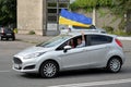 Auto with Ukrainian flags