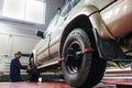 Auto wheel alignment in garage ,SUV maintenance