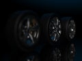 auto wheels on a dark background.