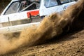 Autocross on a dusty road.