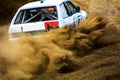 Autocross on a dusty road.