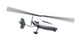Autogyro in flight with rotating propellers Royalty Free Stock Photo