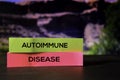 Autoimmune Disease on the sticky notes with bokeh background Royalty Free Stock Photo