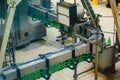 Automated beer bottling production line. Empty beer bottles on conveyor belt