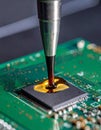 Automated Epoxy Dispensing on a Microchip Royalty Free Stock Photo