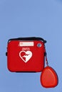 Automated External Defibrillator on Blue Wall Royalty Free Stock Photo