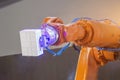Automated hand robot technical production, measurement, study of the parameters of objects. Industrial techno theme Royalty Free Stock Photo
