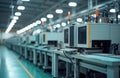 Automated injection molding machines operate in large factory. Modern equipment sits on production line. Components move along
