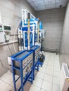 Automated ozone generator for ozonation of pure drinking water in water production factory, close up Royalty Free Stock Photo