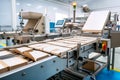 Automated packaging machine sorting and packing products, reducing human error and increasing speed