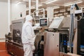 Automated production line with packaging and cutting of meat in modern food factory.Meat processing equipment. Royalty Free Stock Photo