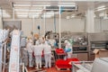 Automated production line with packaging and cutting of meat in modern food factory.Meat processing equipment. Food Royalty Free Stock Photo