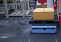 AGV carry cardboard in modern warehouse Royalty Free Stock Photo