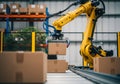 Automated robotic arm efficiently moving cardboard boxes in a modern warehouse facility Royalty Free Stock Photo