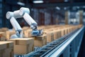 Automated Robotic System Sorting Cardboard Boxes. Royalty Free Stock Photo