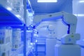 Automated robots organize shelves in a high-tech storage facility