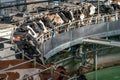 Automated rotary cow milking machine equipment on dairy farm. Many black and white cows on modern industrial round camp Royalty Free Stock Photo