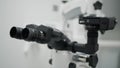 Automated scientific microscope close-up.