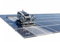 Automated solar panel cleaning robot on array isolated on white background Royalty Free Stock Photo