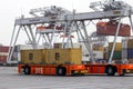 Automated vehicles moving shipping containers to and from gantry cranes in the Port of Rotterdam, The Netherlands, September 6,