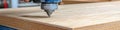 Automated Woodworking CNC Router Precision Cutting Plywood Panel in Workshop Setting