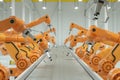 Automatic assembly line. Orange robot arm manipulator with empty conveyor belt. Technology concept, future. 3D rendering, 3D