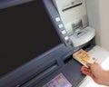 Automatic ATM to withdraw money in European 50 Euro banknotes in Europe Royalty Free Stock Photo