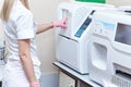 Automatic blood test analyzer in a medical laboratory Royalty Free Stock Photo