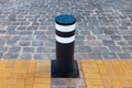 Automatic bollard. Retractable Electric Bollard Metallic, and hydraulic for the control of road traffic Royalty Free Stock Photo