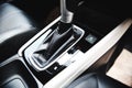 Automatic car transmission shift lever interior car detail - automatic gear and button econ mode Reducing fuel consumption
