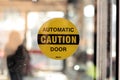 Automatic caution door