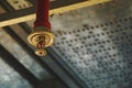 Automatic ceiling Fire Sprinkler in red water pipe System Royalty Free Stock Photo