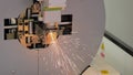 Laser cutting machine working with metal square pipe with sparks - slow motion