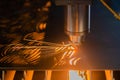 Automatic cnc laser cutting machine working with sheet metal with sparks Royalty Free Stock Photo