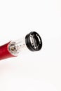 Automatic corkscrew for opening bottle caps. Electric Wine Bottle Opener Royalty Free Stock Photo